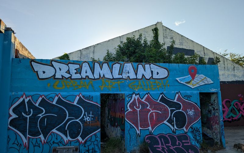Exterior of the Dreamland Urban Art Gallery building painted with graffiti